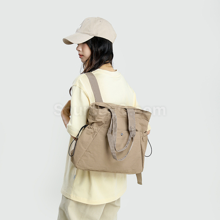 礼品订购大容量百搭抽绳休闲包广告